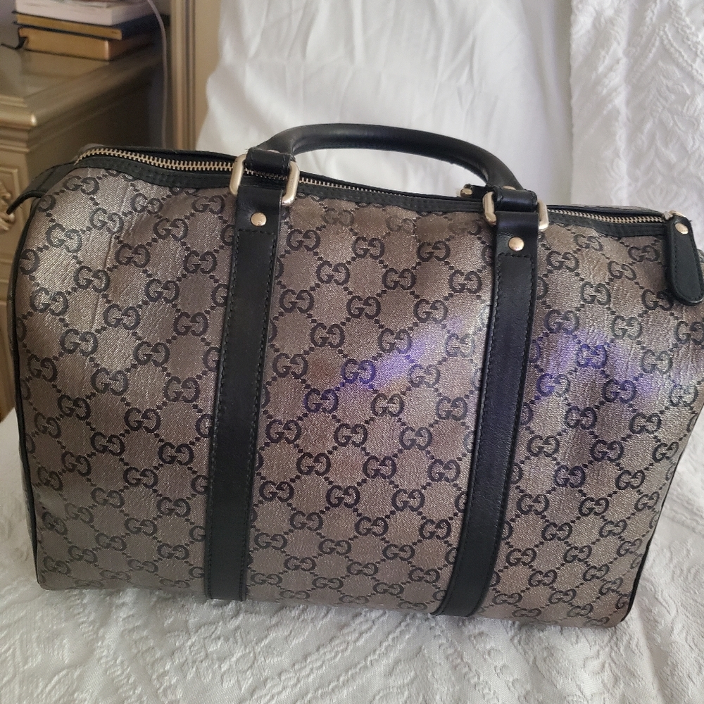 Authentic gucci black GG crystal canvas medium joy Boston bag.